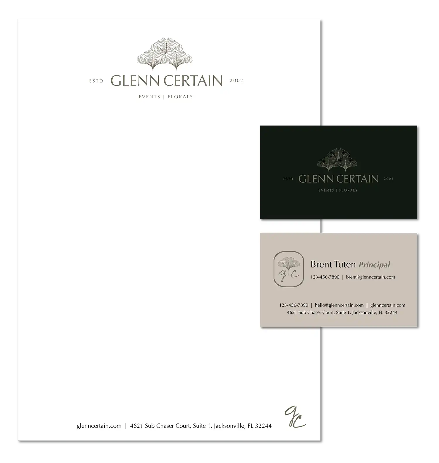 Stationery mockup displaying letterhead and business cards for Glenn Certain featuring custom logos and botanical branding.